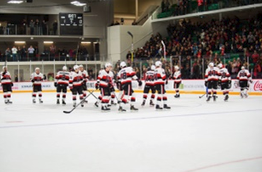 Yardmen Arena. Hockey players on the ice.