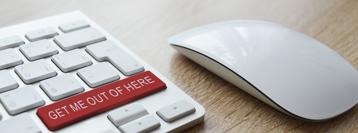 A mouse next to a keyboard with a red button that says GET ME OUT OF HERE in white text.