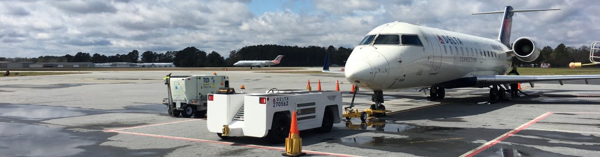 Coastal Carolina Regional Airport, a jet parked on the tarmac.