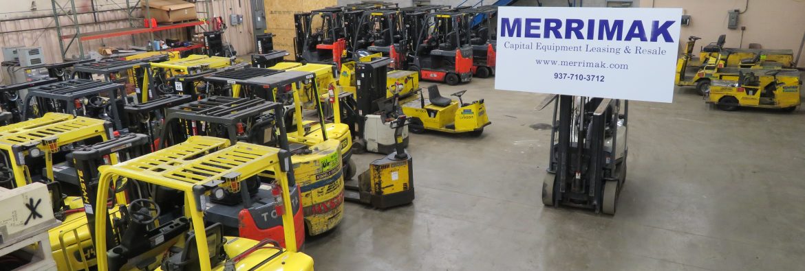 Merrimak Capital Company LLC warehouse showing forklifts and other rental equipment.