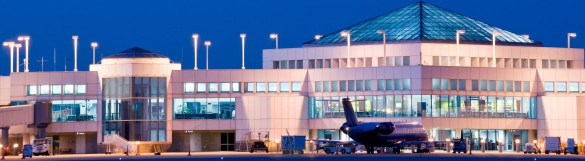 Columbia Metropolitan Airport at dusk on the runway side.