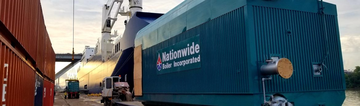 A Nationwide Boiler Inc boiler being loaded onto a ship heading to Saudi Arabia.