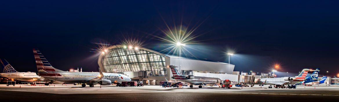 Fresno Yosemite International Airport external view of concourse at night.