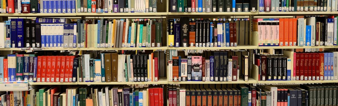 A book shelf in a library.