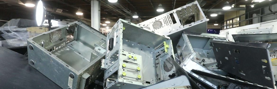 Allocco Recycling and GreenChip. A pile of computer cases.