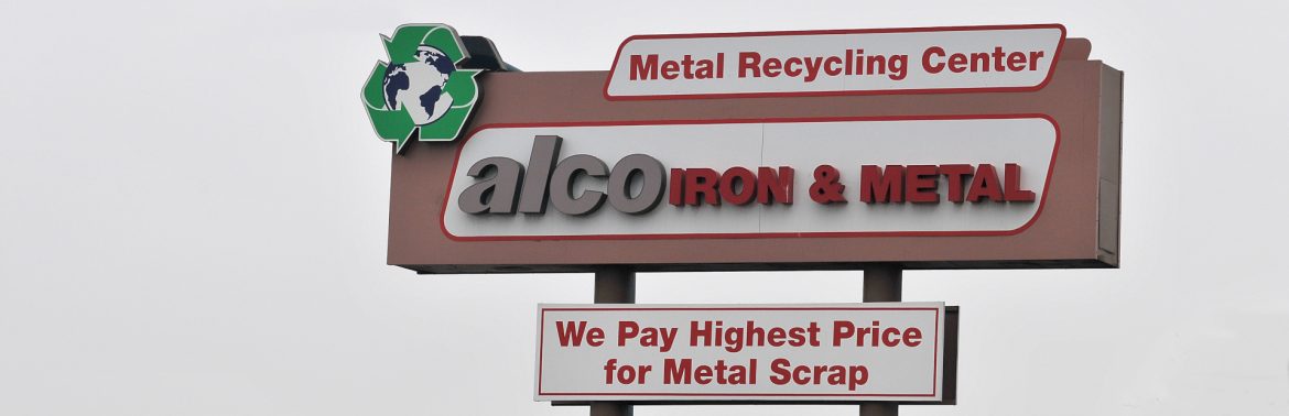 Alco Iron & Metal Company sign.