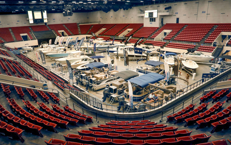 RP Funding Center Boat Show on the stadium floor with stadium seats around..