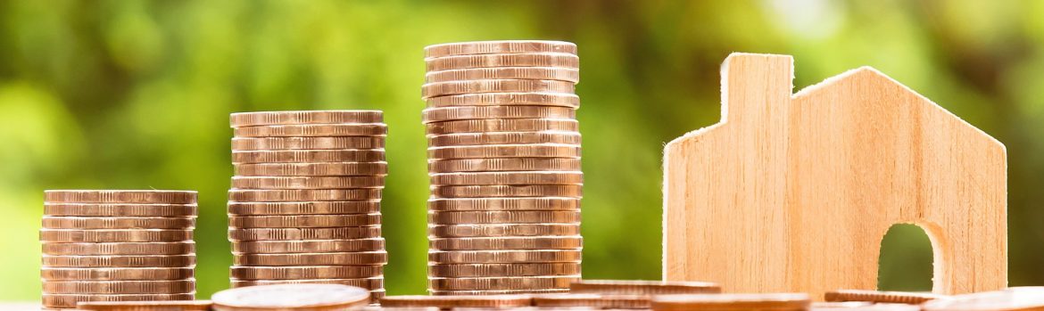 3 stacks of coins going left to right, getting taller, with a wooden house outline on the right.