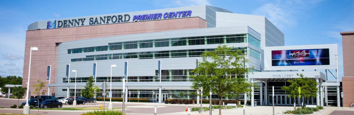 The Denny Sanford PREMIER Center front view of building from the ground.