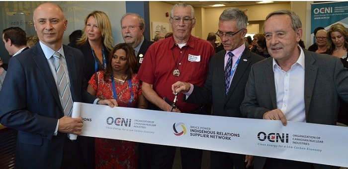 Organization of Canadian Nuclear Industries ribbon cutting.