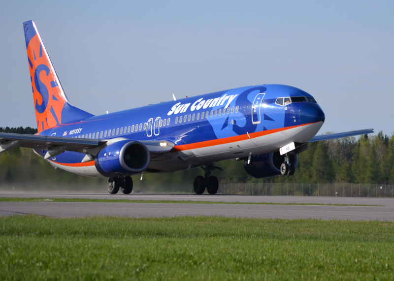 Range Regional Airport, Sun Country jet taking off.