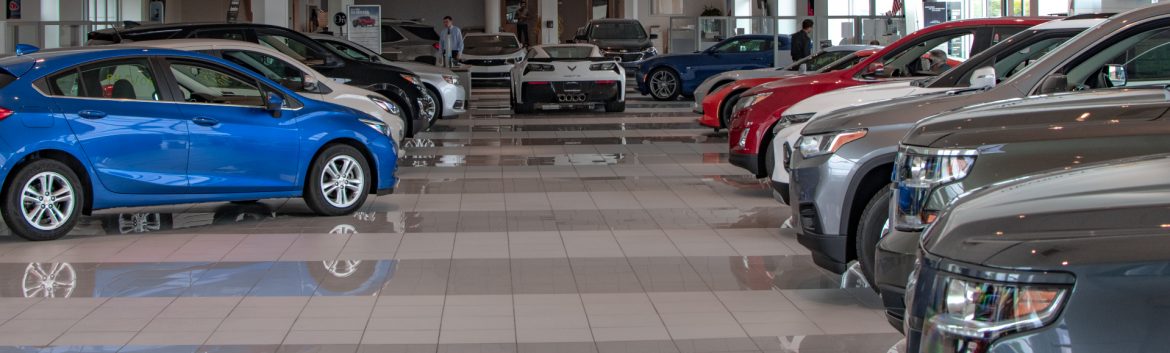 Reedman-Toll Auto World showroom interior.