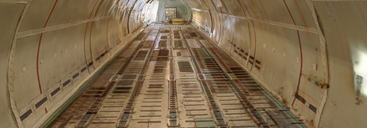 Flying Fresh Air Freight interior of a freight airplane that is empty.