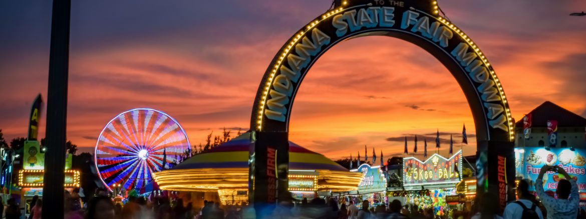 Indiana State Fairgrounds near sunset showing the entrance sign saying welcome to the indiana state fair.