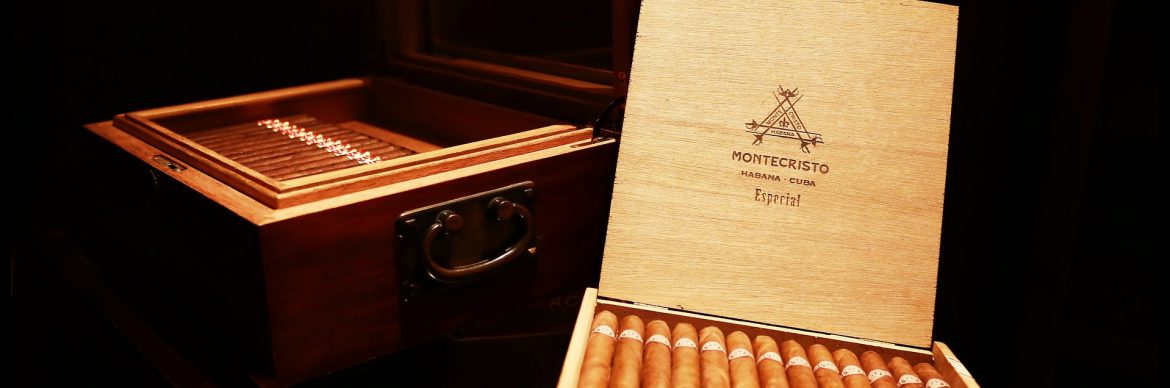 Top Executive Brands featured image showing two wooden boxes of Cuban cigars. Montecristo Especial visible on the right box lid.