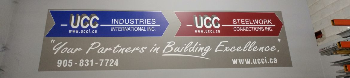 UCC Industries International Inc image showing a UCC Industries International sign next to one that says UCC Steelwork Connections Inc.