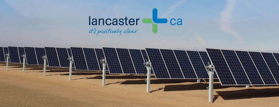 Lancaster, California solar farm with the city logo above.