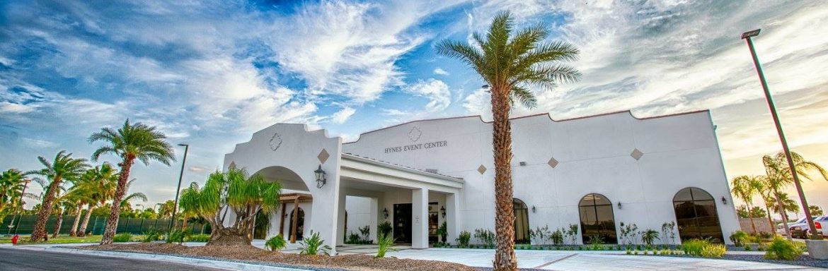 Mercedes, Texas Hynes Event center with a pretty blue sky with scattered white clouds.