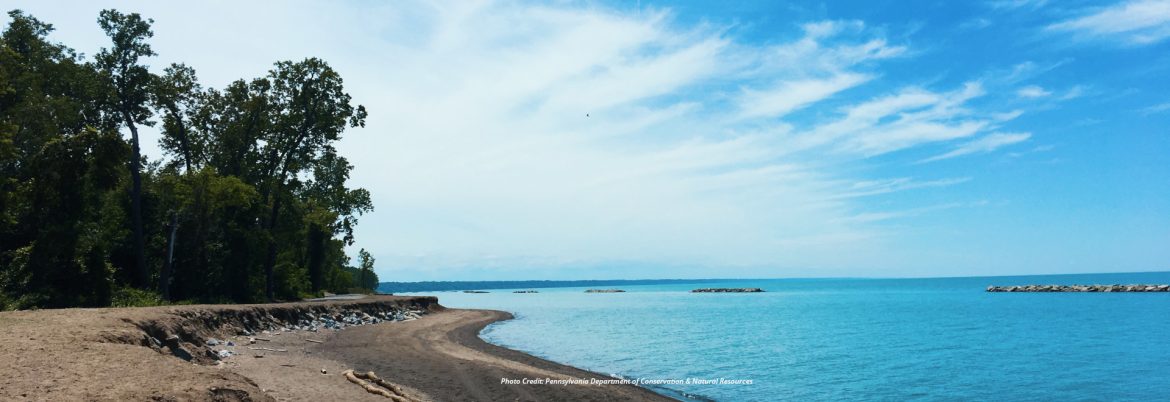 Millcrek Township, New Jersey Presque Isle courtesy of the Pennsylvania Department of Conservation & Natural Resources with a beach and blue sky.