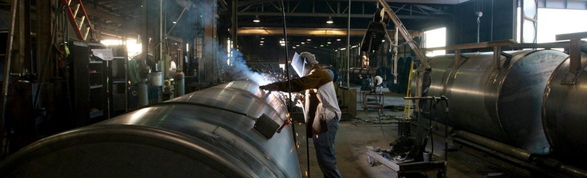 Newberry Tanks & Equipment Inc. worker welding a tank.