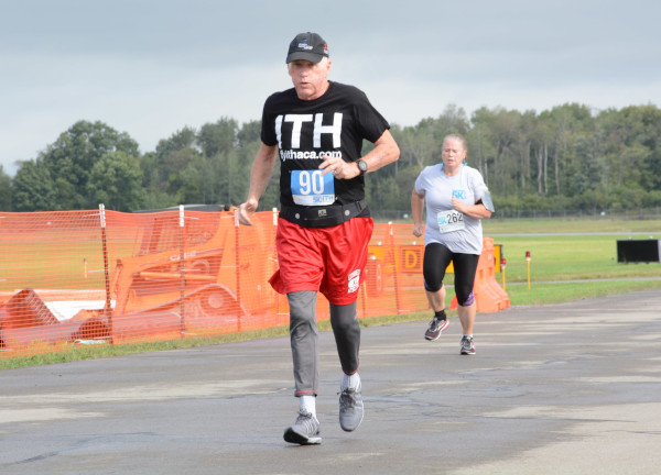Ithaca Tompkins Regional Airport Director Mike Hall running a marathon at the airport.
