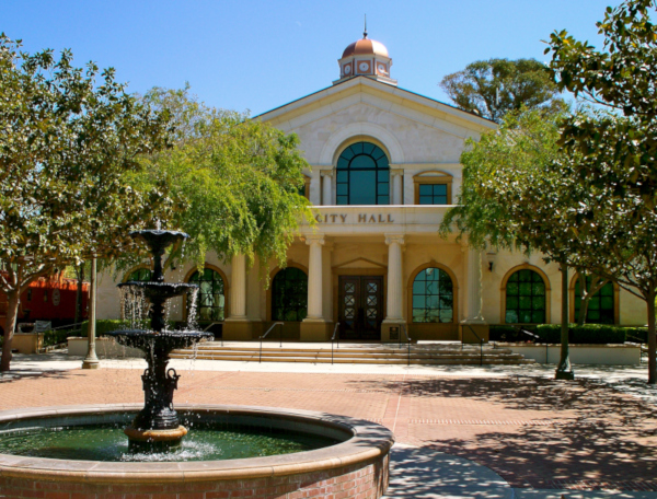 Fillmore, California city hall building with a fountain in the foreground.