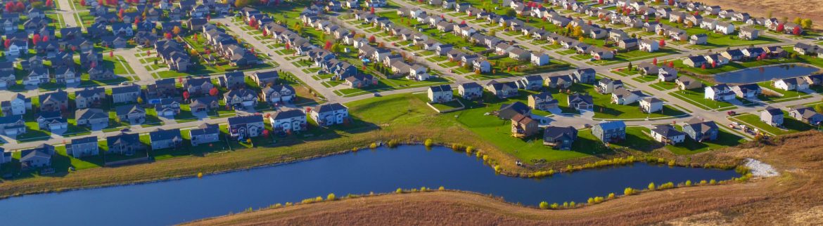 Waukee, Iowa aerial view of Kettlestone with rows of houses and some water..