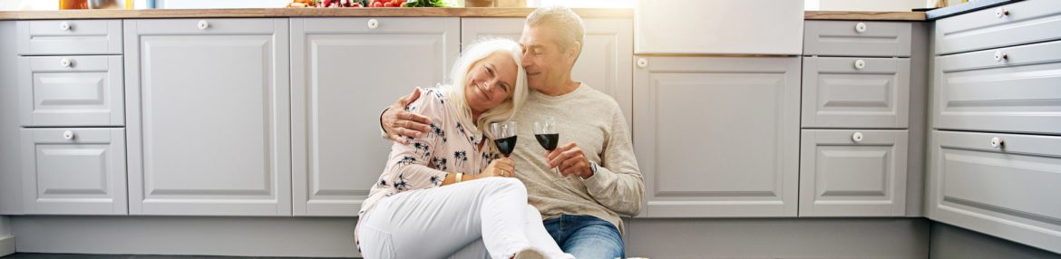 The Grout Medic - couple drinking wine on tiled floor.