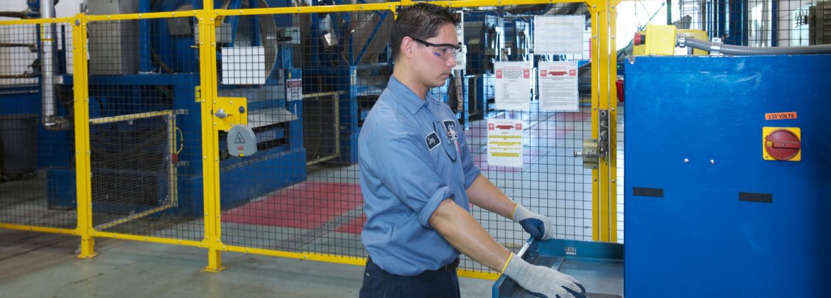 Textile Rental Services Association TRSA Cintas employee in colombus working a machine.