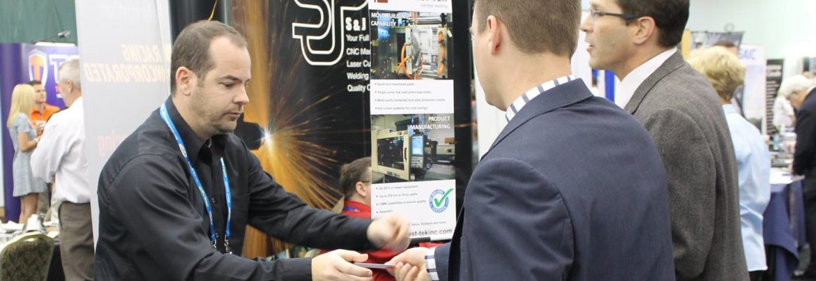 Buy Indiana Expo event with two men exchanging something between hands.