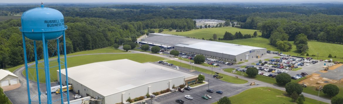 Russell County, Kentucky industrial site with water tank on the left, aerial view.