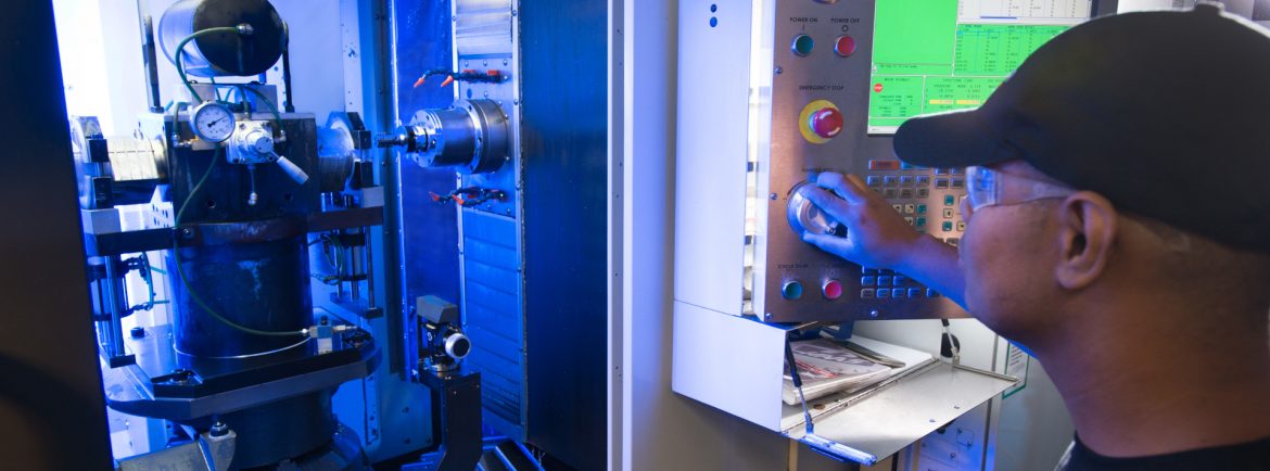 Lamar Tool & Die Casting Inc. person controlling a machine.