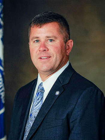 President, Dr. Kirk Peterson