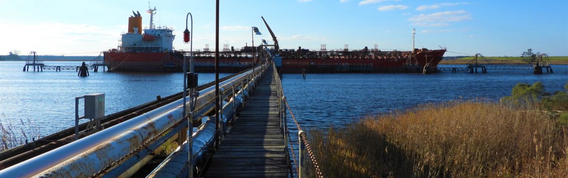 Chemserve Terminal walkway to boat on water.