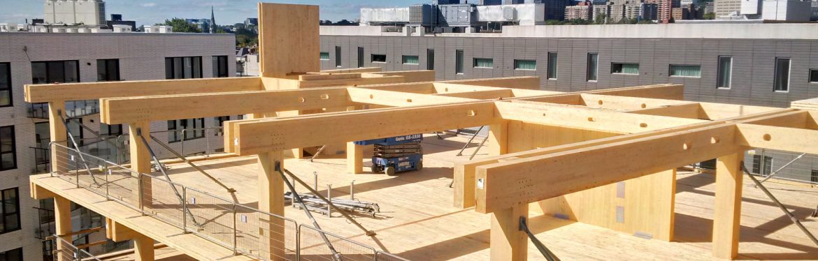 FPInnovations building example showing wood timber frame at a construction site.