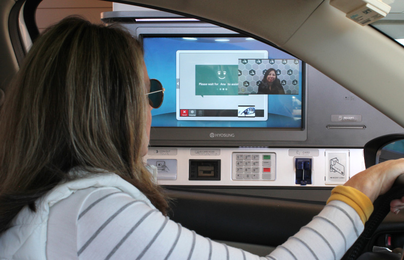 A Triangle Credit Union member uses the Interactive Teller Machine (ITM) at the Merrimack, NH branch